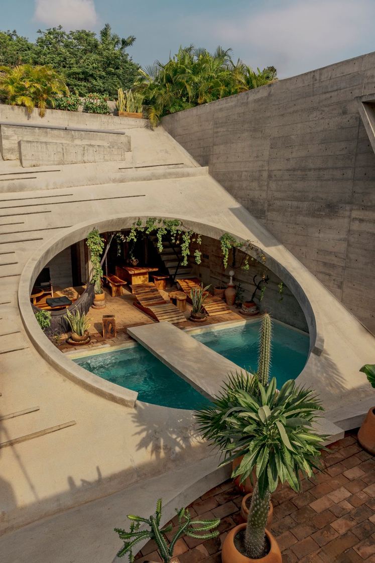 The pool and concrete bridge seen from the roof terrace
